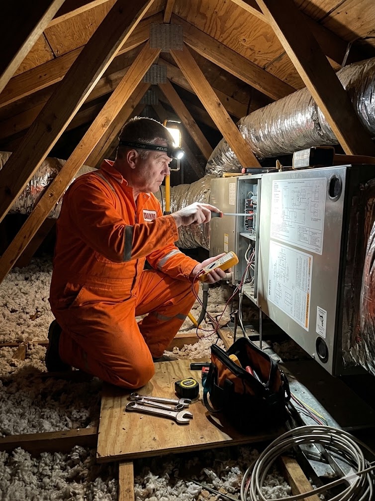 Crystal AC Service technician working on equipment